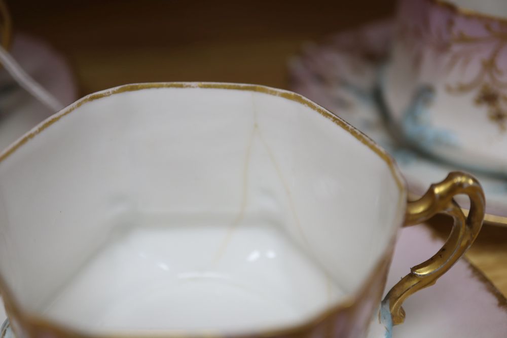 A Limoges porcelain part coffee service, with floral decoration heightened in gilt (9 pieces), coffee pot H.23cm